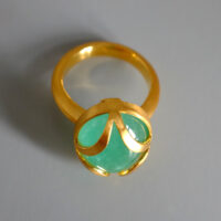 SIJS, emerald cabochon ring, big cabochon emerald, emerald engagement ring singapore, cage gold ring, colombian emerald ring, bespoke jewelry singapore, custom jewellery singapore, emerald 22k gold ring